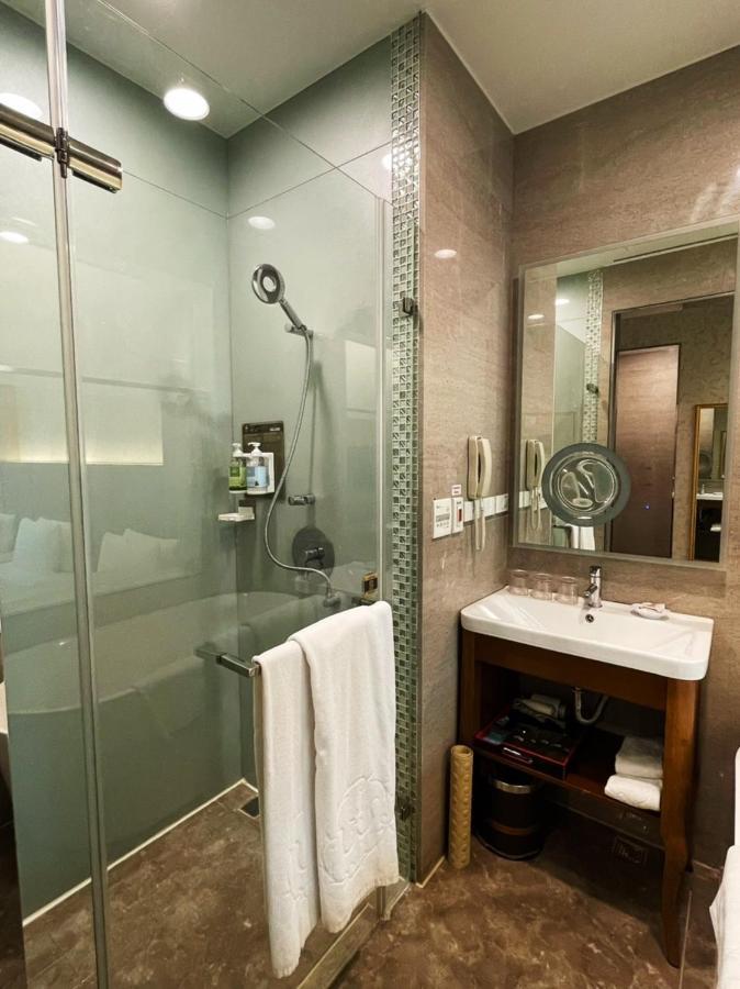 Happiness Inn Hotel Xinzhuang Bagian luar foto